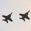 Two FA-18 Hornets flew over the ceremony Thursday night.